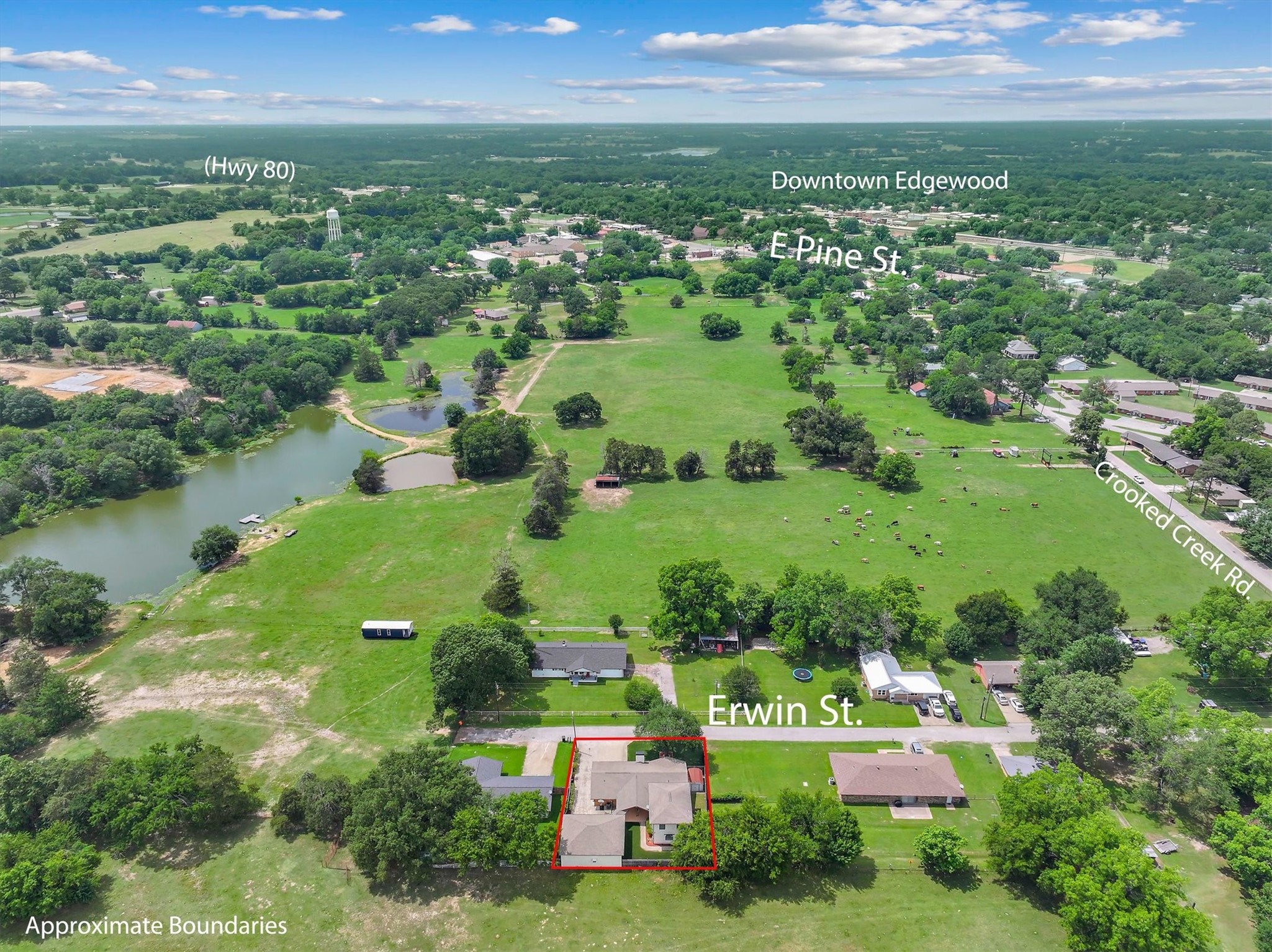 302 Erwin Street Edgewood, TX 75117 - Photo 39 of 40 an aerial view of city lake and trees all around