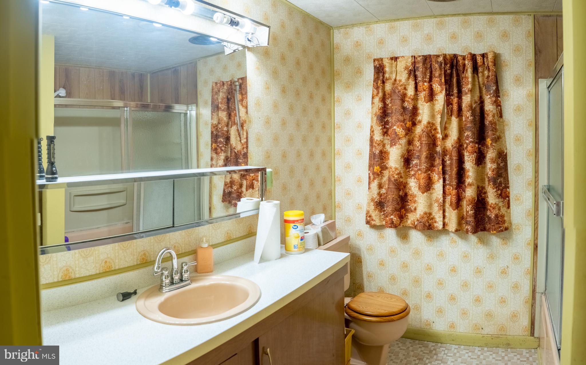 165 Fairground Road Prince Frederick, MD 20678 - Photo 14 of 27 a bathroom with a sink toilet and shower