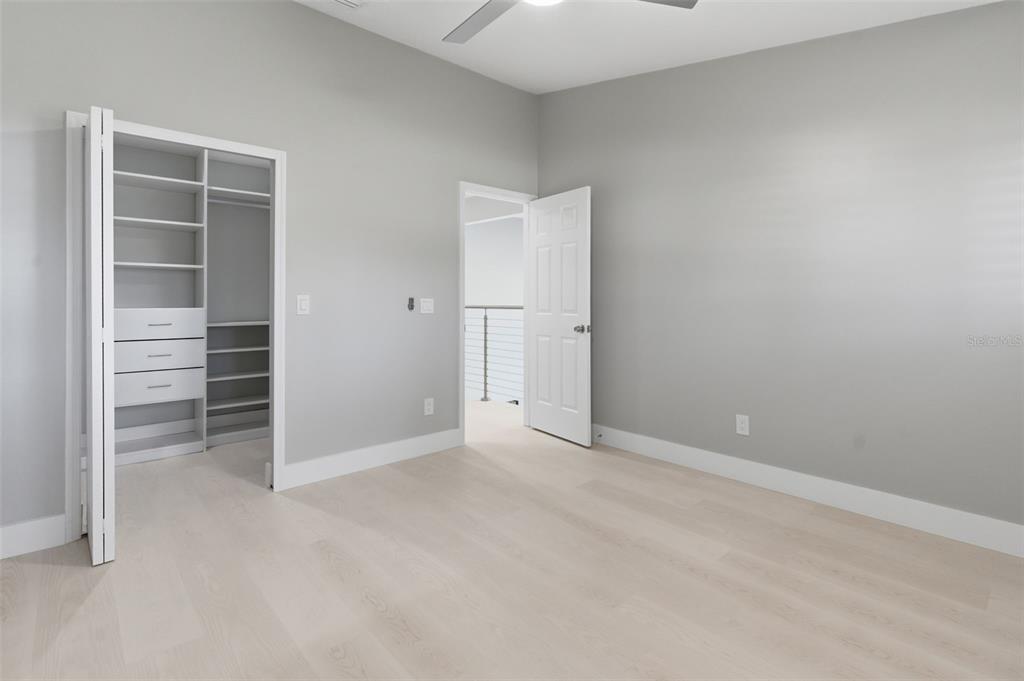 8044 Sandpoint Boulevard Orlando, FL 32819 - Photo 18 of 34 an empty room with a empty space and window