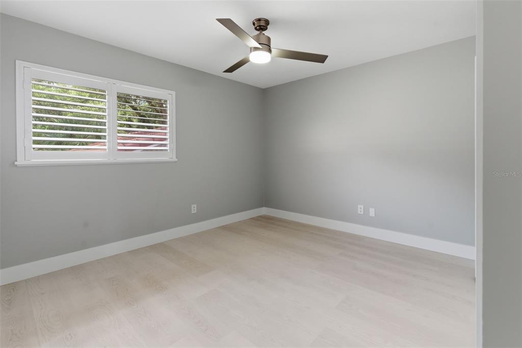 8044 Sandpoint Boulevard Orlando, FL 32819 - Photo 22 of 34 an empty room with a window