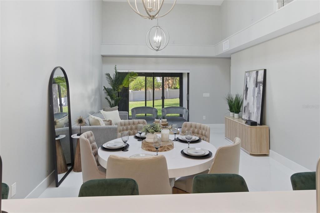 8044 Sandpoint Boulevard Orlando, FL 32819 - Photo 6 of 34 a view of a dining room with furniture window and outside view