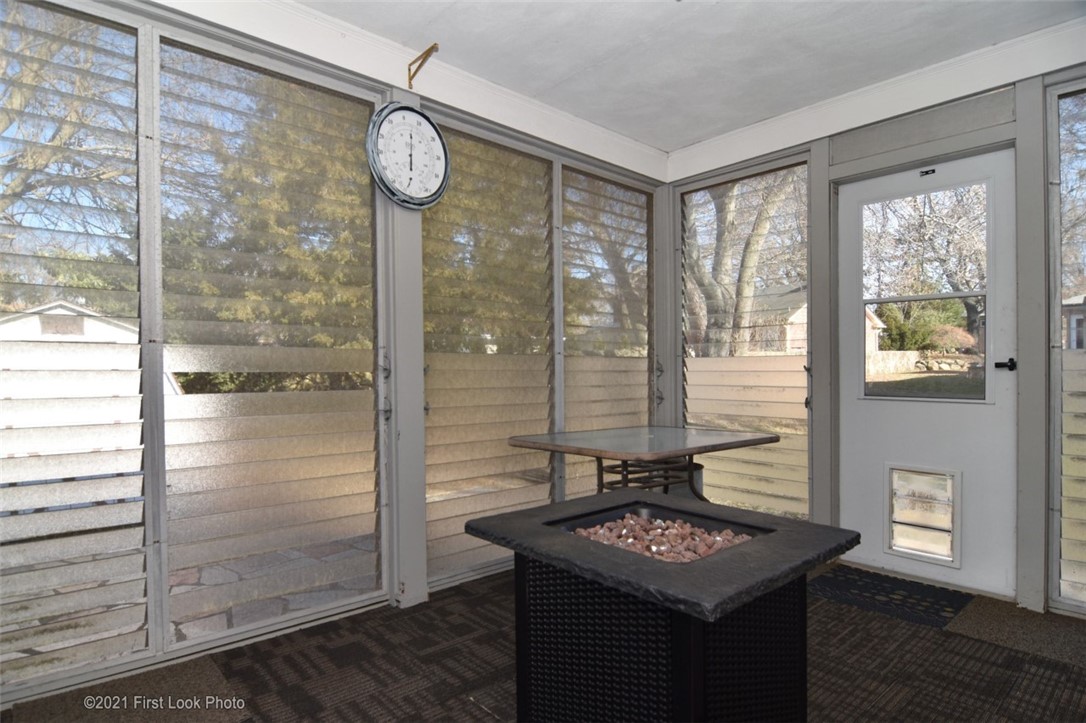 27 Susan Circle Johnston, RI 02919 - Photo 29 of 32 3 Season Room/ with pit