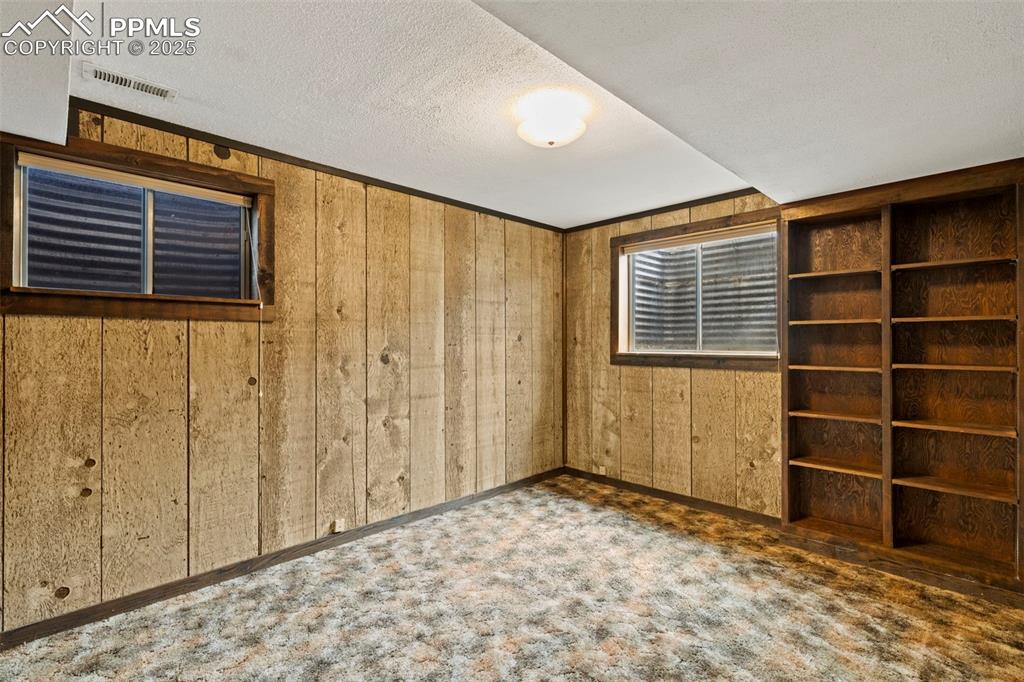 2113 Roundtop Court Colorado Springs, CO 80918 - Photo 27 of 34 a view of empty room with a window