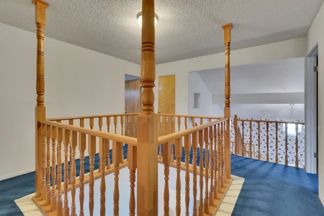 a stove top oven sitting inside of a kitchen