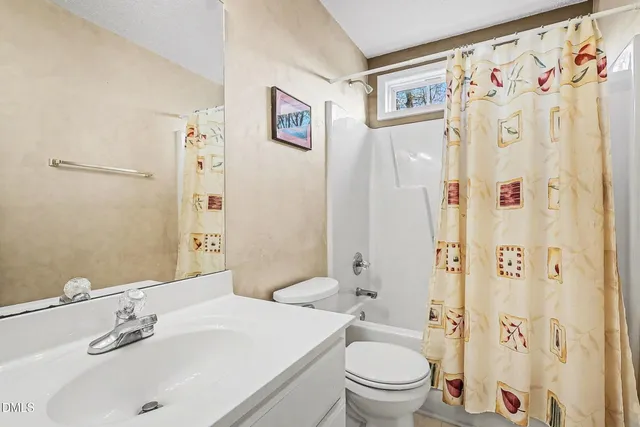 a house view with a backyard space