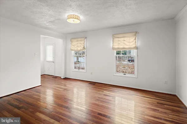 a kitchen with a stove and a microwave