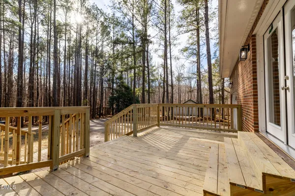 a view of a outdoor space with a patio and backyard