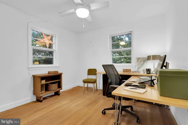 a workspace with furniture and window