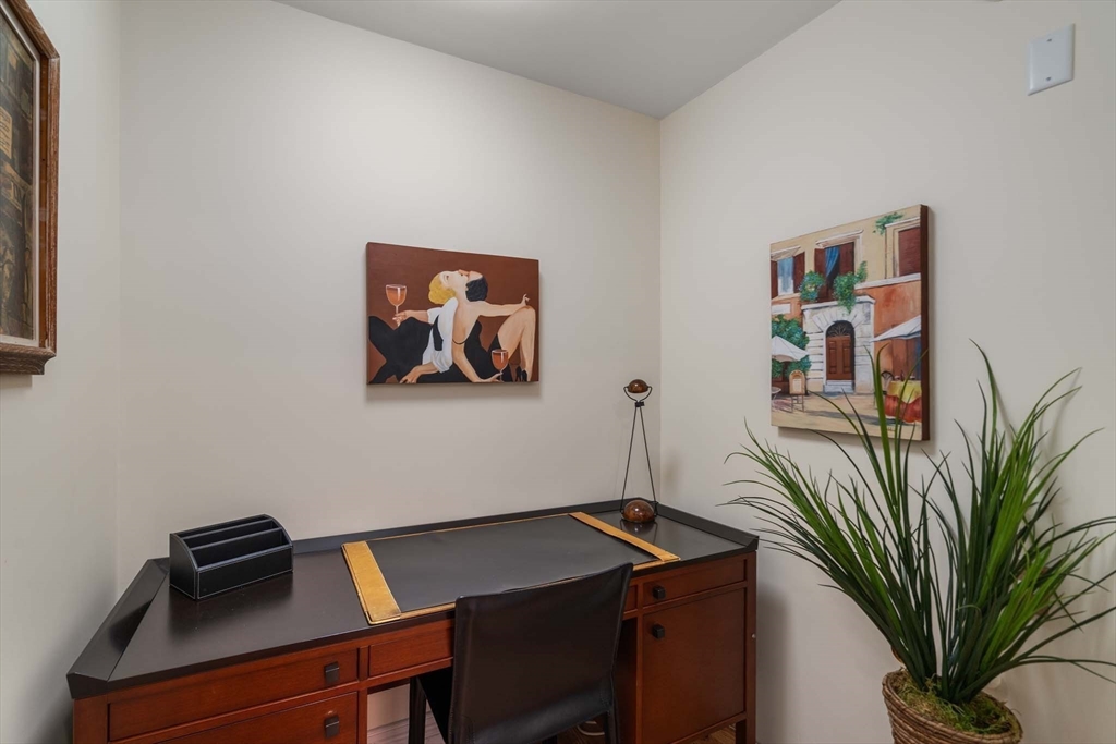 630 Hammond Street, Unit 102 Brookline, MA 02467 - Photo 18 of 19 a view of a workspace with furniture