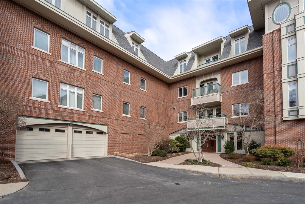 630 Hammond Street, Unit 102 Brookline, MA 02467 - Photo 3 of 19 a view of a building with a street