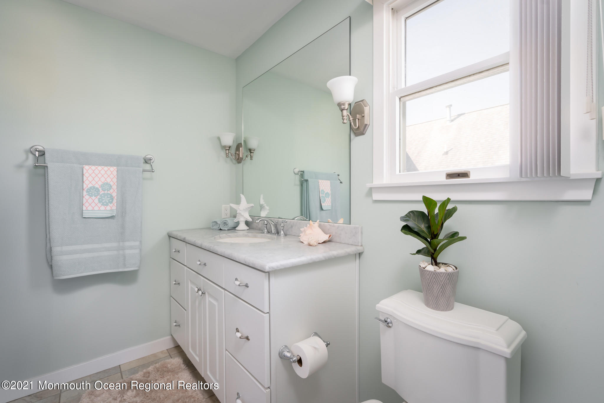 97 Dolphin Road Tuckerton, NJ 08087 - Photo 22 of 53 a bathroom with a sink a toilet and a mirror
