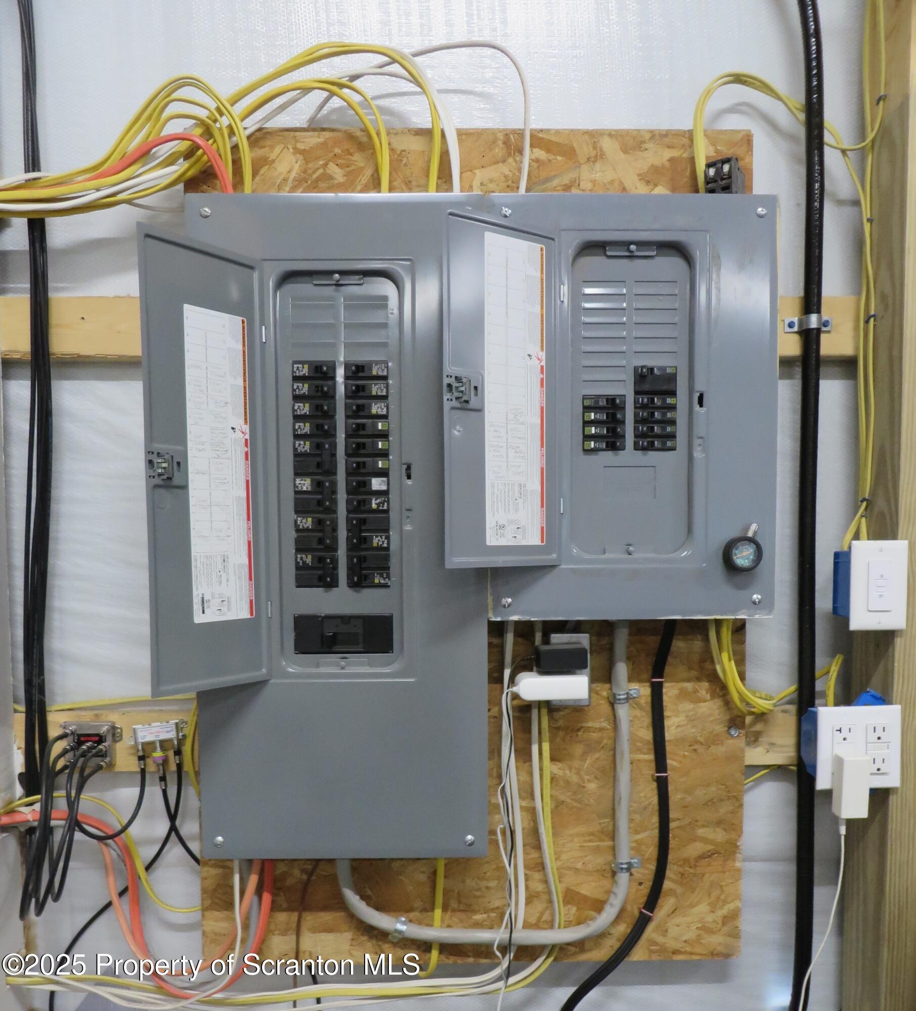 1656 Mt Cobb Road Moscow, PA 18444 - Photo 32 of 36 32-Electrical Panels (200 Amp+100 Amp Su