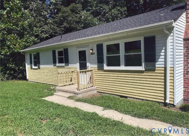 a front view of a house with a porch