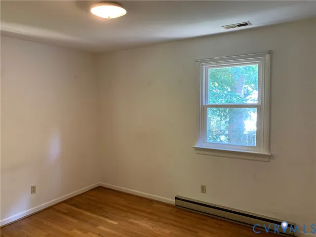 an empty room with a window