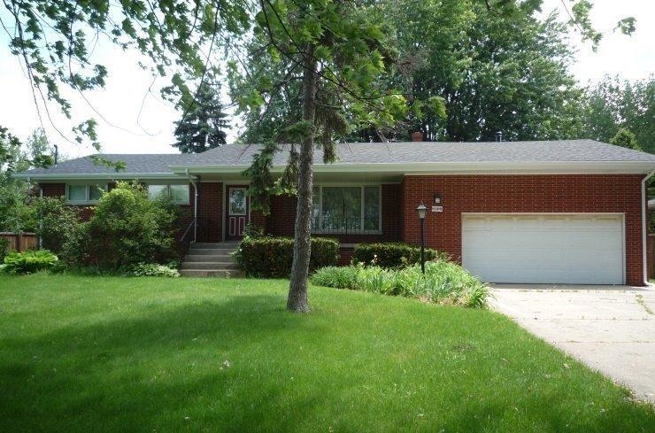 9309 Kleinman Road Highland, IN 46322 - Photo 1 of 10 a view of a house with a yard and tree