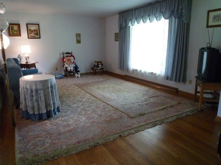 9309 Kleinman Road Highland, IN 46322 - Photo 2 of 10 a view of a livingroom with furniture and a window
