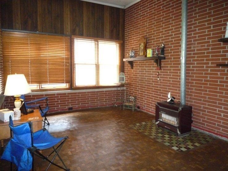 9309 Kleinman Road Highland, IN 46322 - Photo 4 of 10 a view of a chairs and table in the room