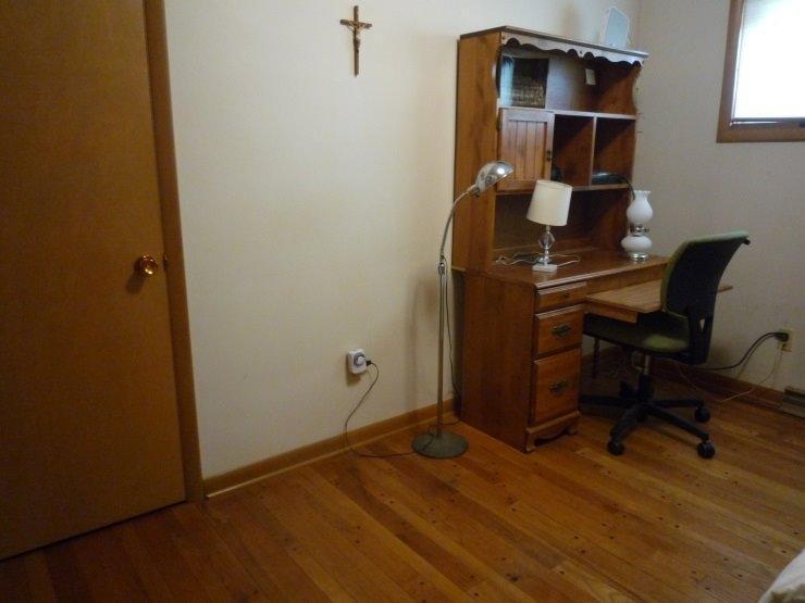 9309 Kleinman Road Highland, IN 46322 - Photo 5 of 10 a room with wooden floor and furniture