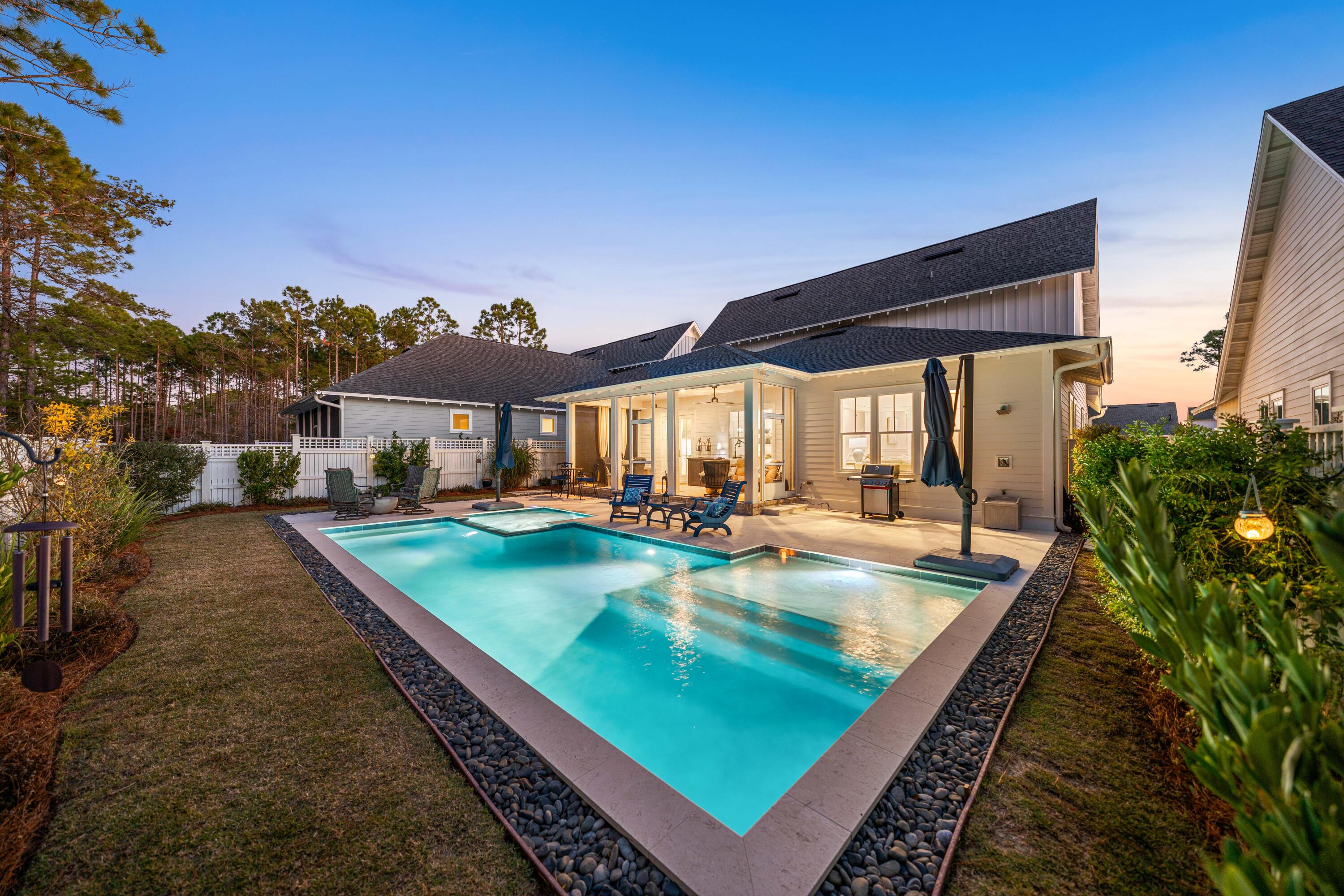 41 East Firethorn Cir Inlet Beach Inlet Beach, FL 32461 - Photo 18 of 66 a view of a patio with swimming pool