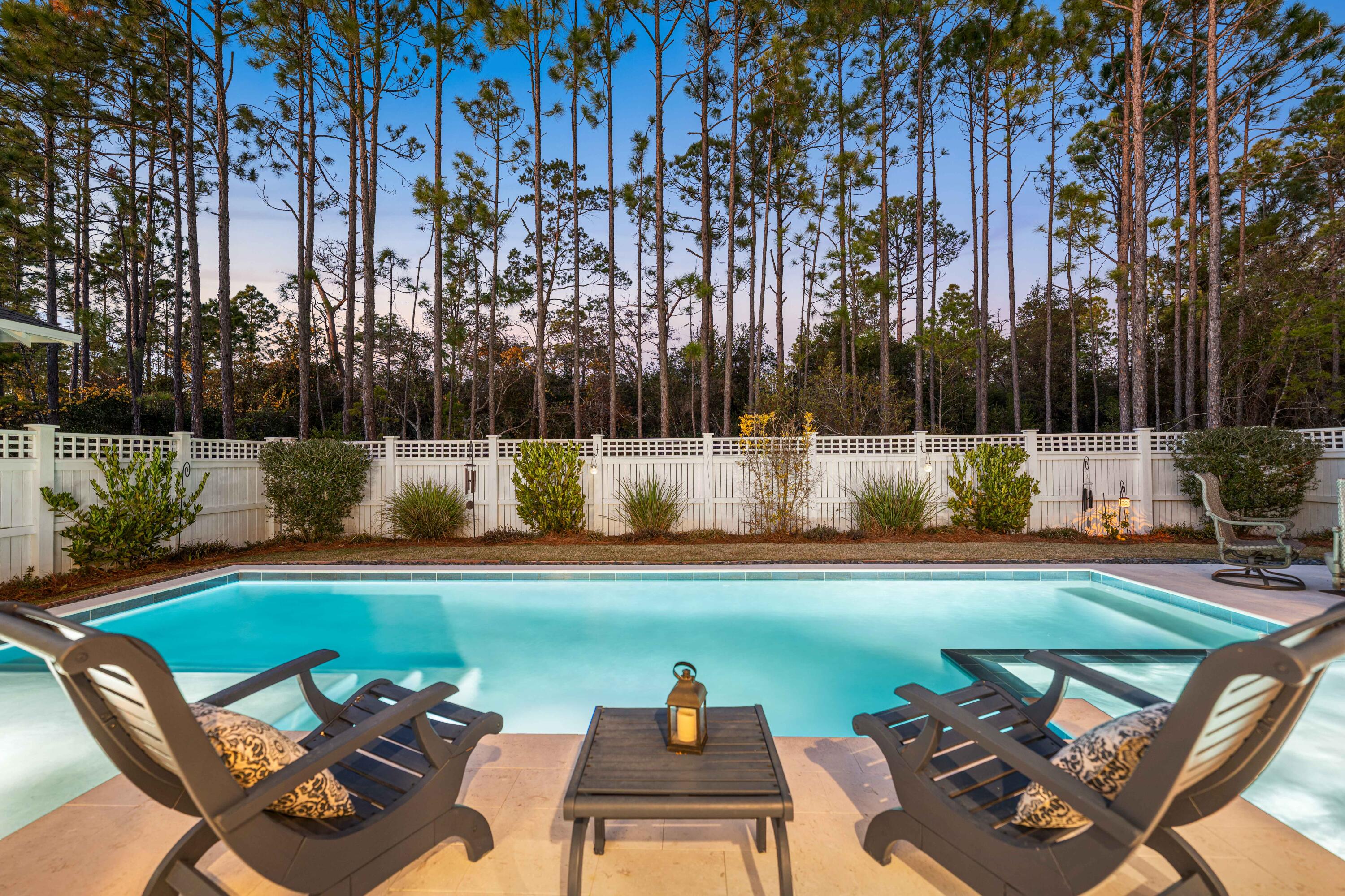 41 East Firethorn Cir Inlet Beach Inlet Beach, FL 32461 - Photo 20 of 66 a view of a swimming pool and lounge chairs in patio
