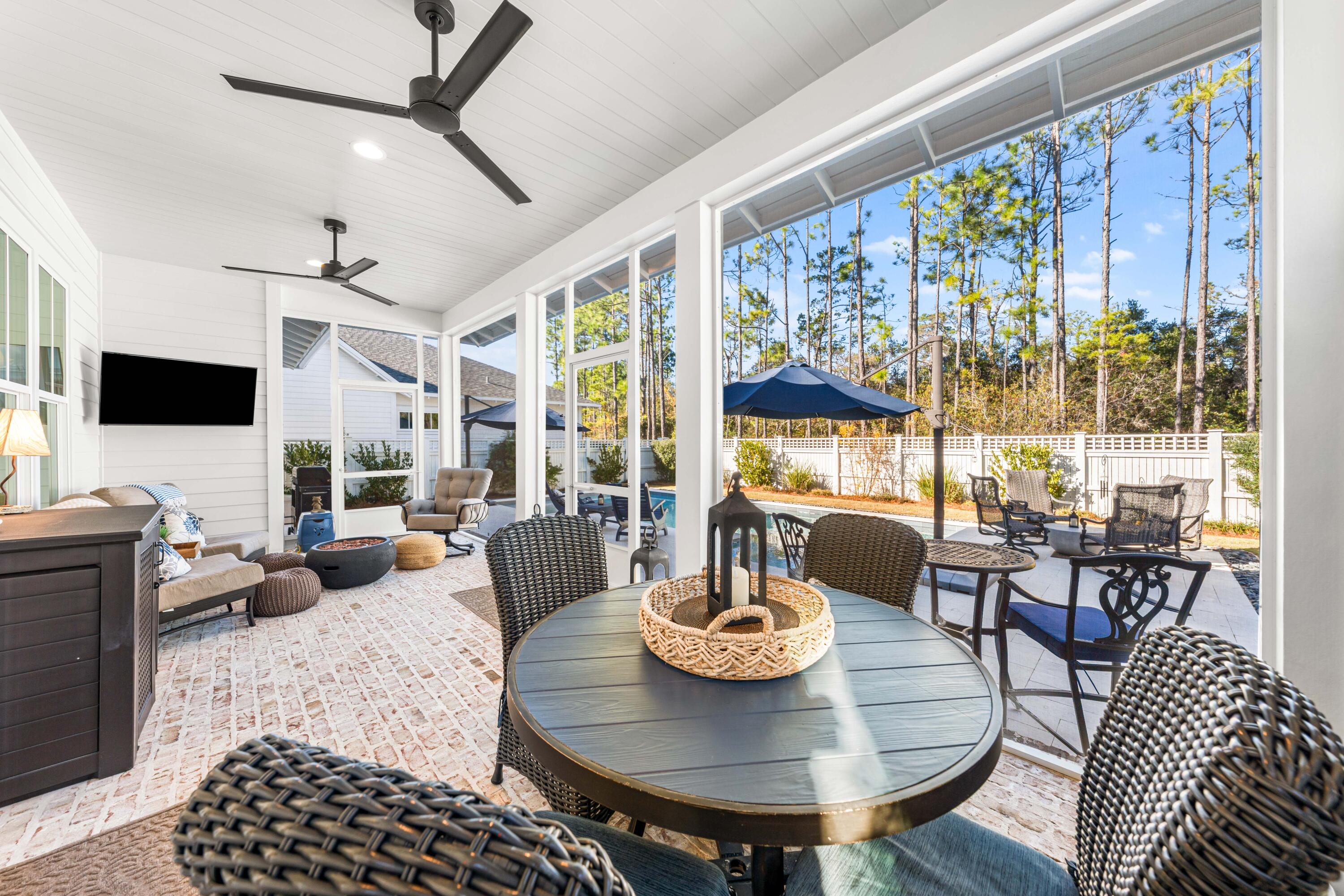 41 East Firethorn Cir Inlet Beach Inlet Beach, FL 32461 - Photo 23 of 66 a living room with furniture and a flat screen tv