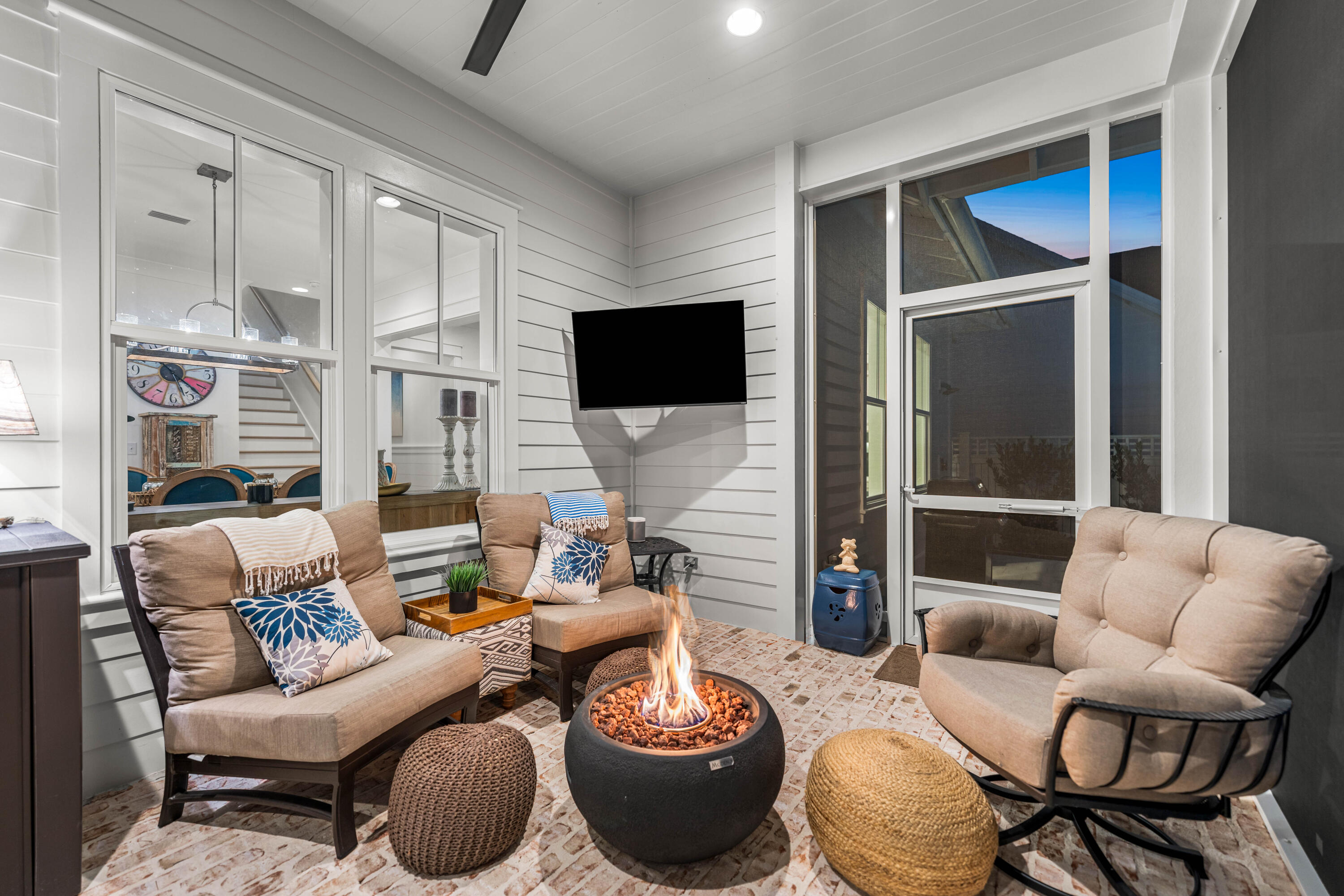 41 East Firethorn Cir Inlet Beach Inlet Beach, FL 32461 - Photo 24 of 66 a living room with furniture a flat screen tv and a large window