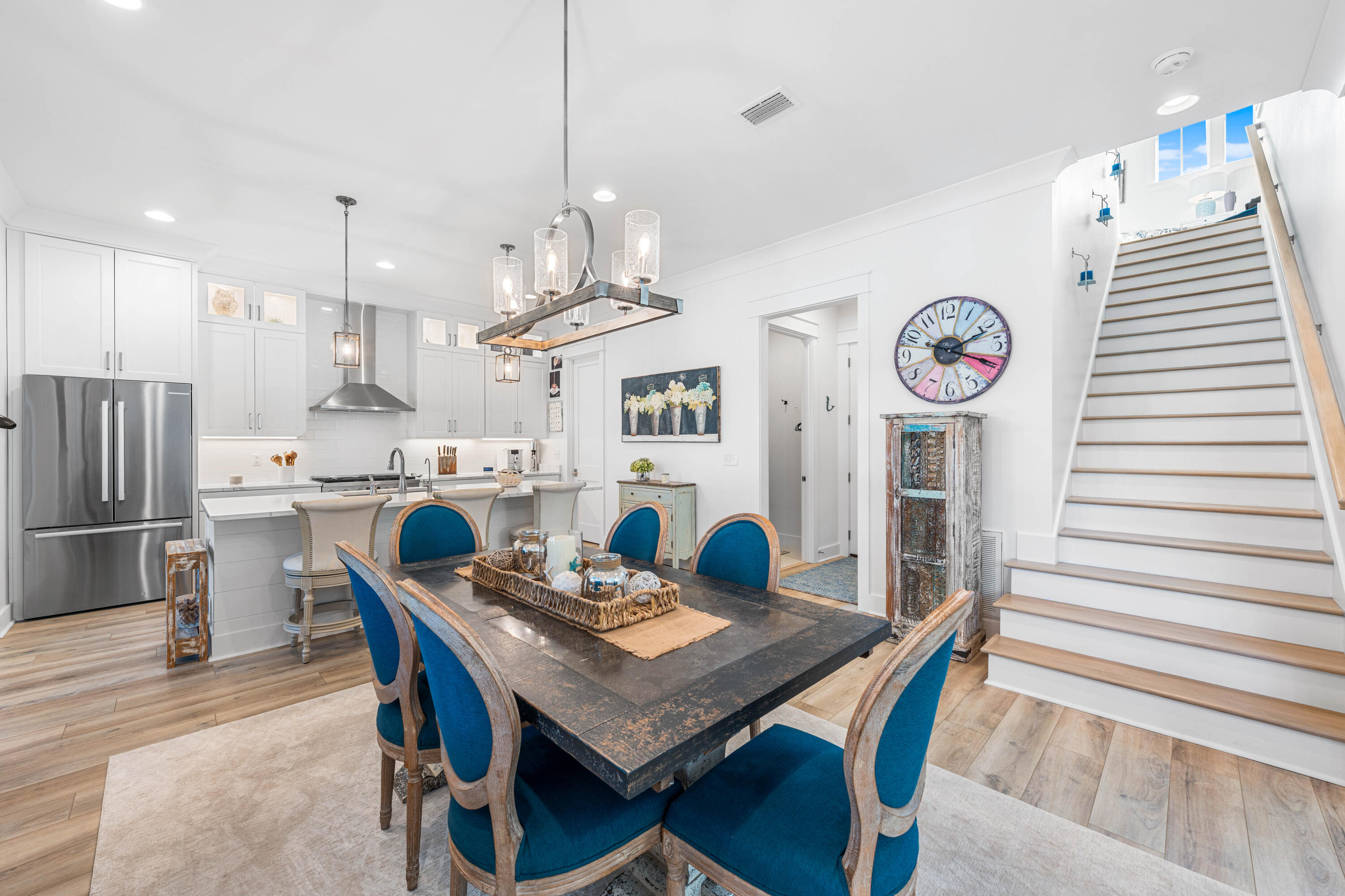 41 East Firethorn Cir Inlet Beach Inlet Beach, FL 32461 - Photo 31 of 66 a view of a dining room with furniture and a chandelier