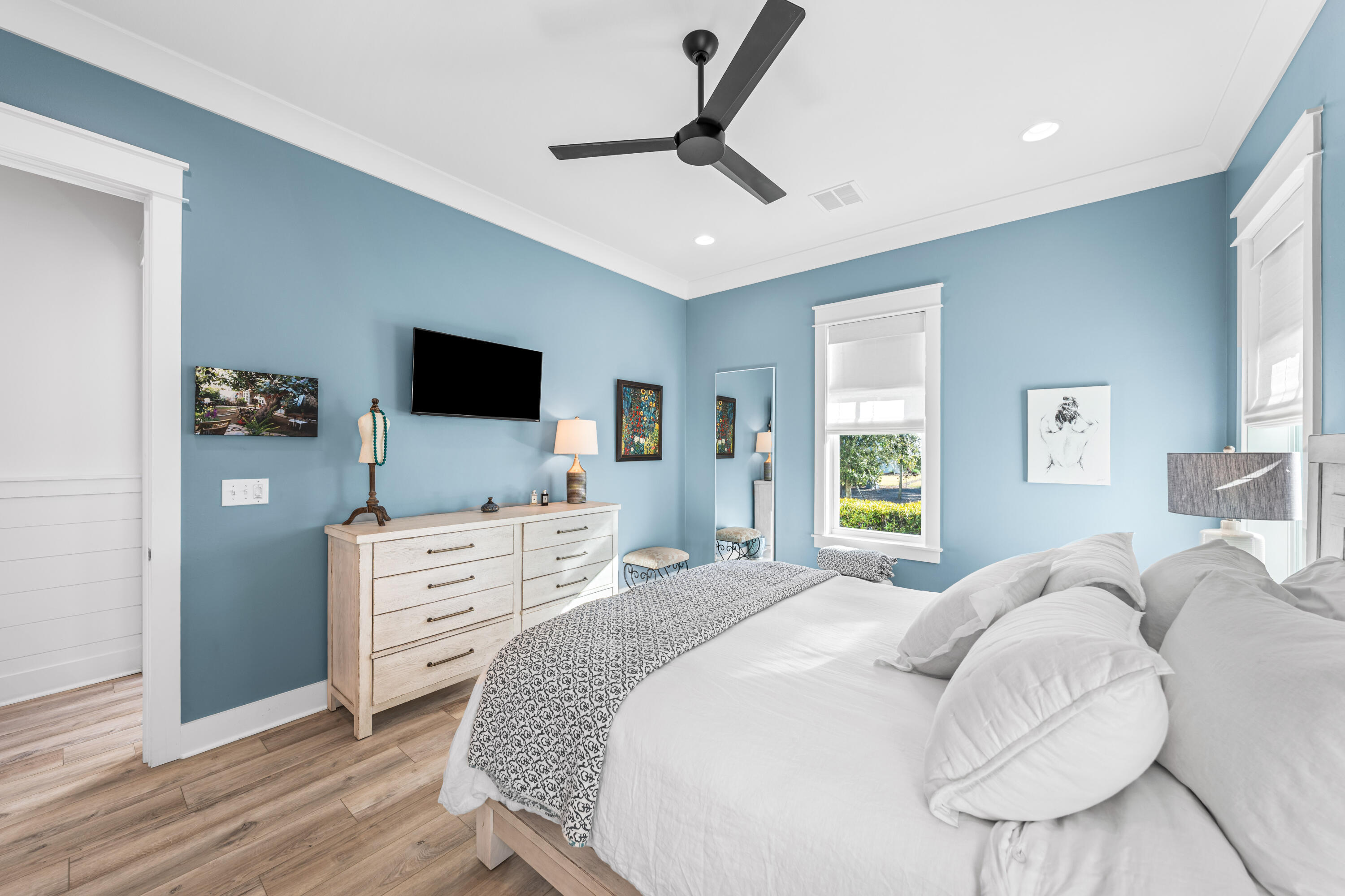 41 East Firethorn Cir Inlet Beach Inlet Beach, FL 32461 - Photo 44 of 66 a bedroom with a bed and a flat screen tv