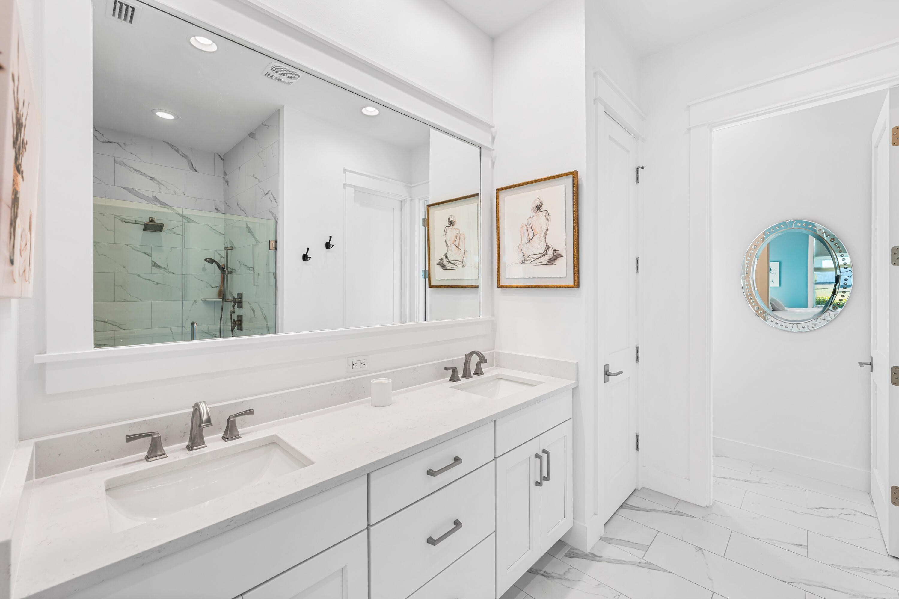 41 East Firethorn Cir Inlet Beach Inlet Beach, FL 32461 - Photo 47 of 66 a bathroom with a double vanity sink and a mirror