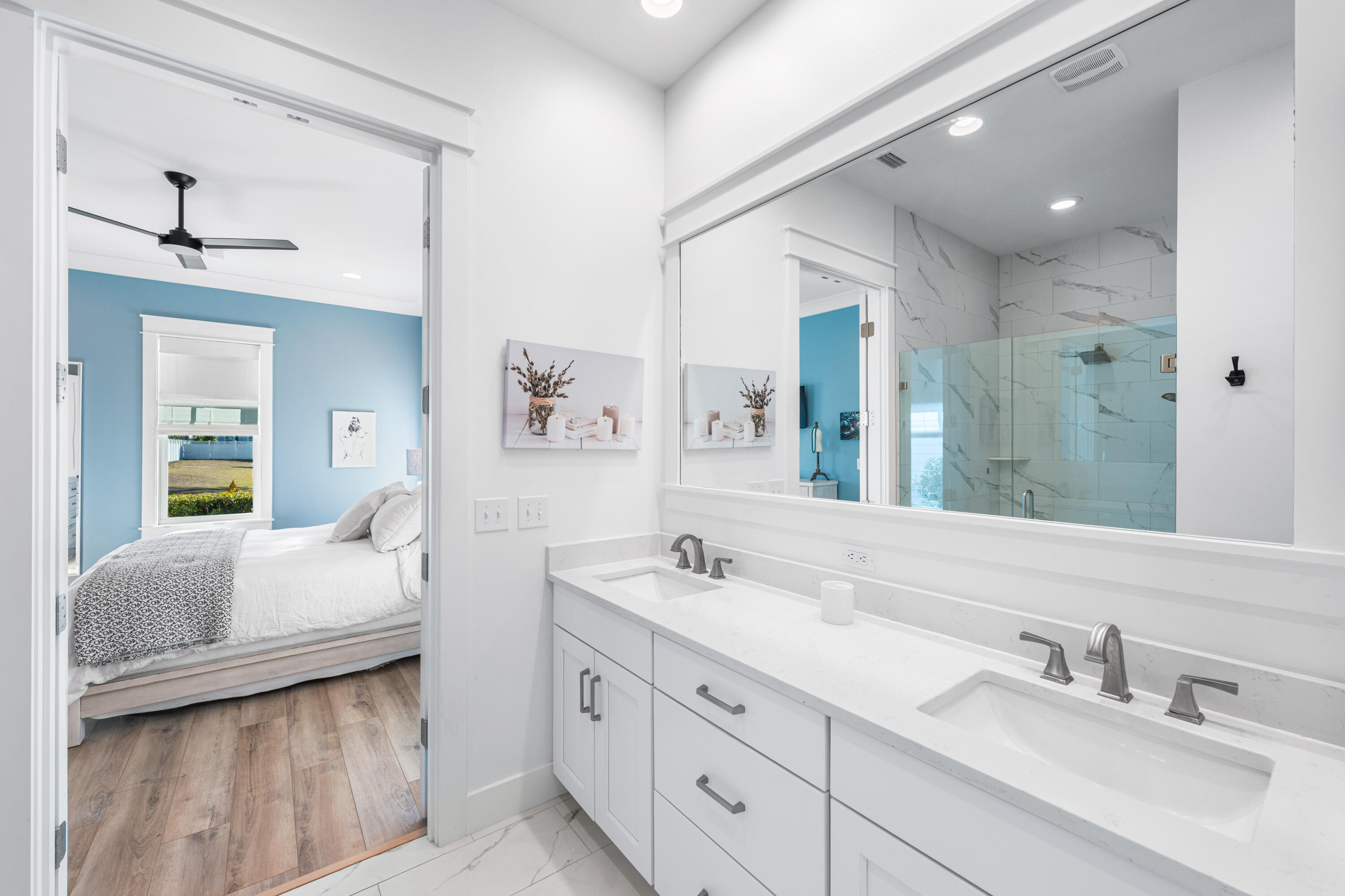 41 East Firethorn Cir Inlet Beach Inlet Beach, FL 32461 - Photo 48 of 66 a en suite bathroom with double sink and a mirror