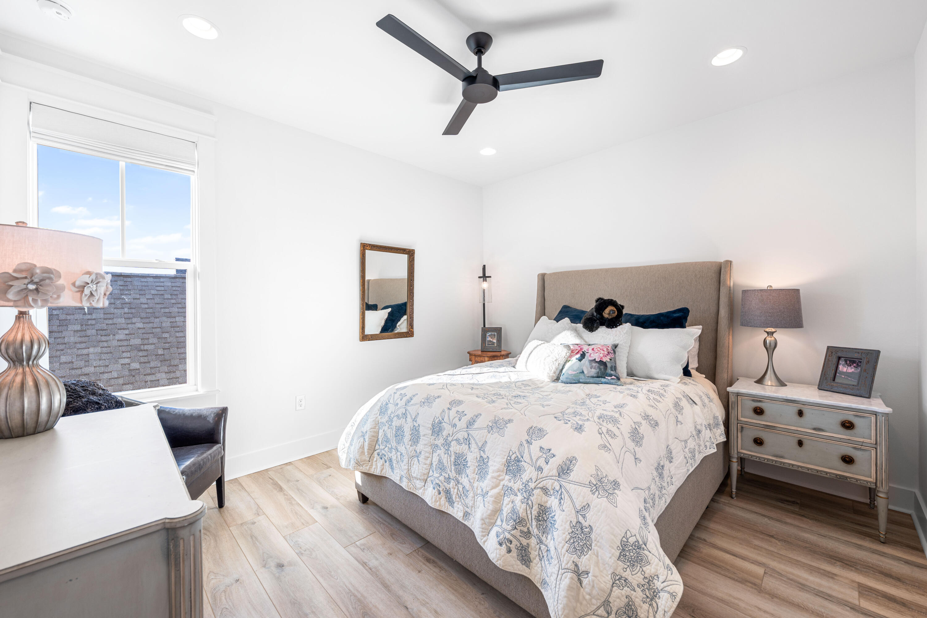 41 East Firethorn Cir Inlet Beach Inlet Beach, FL 32461 - Photo 53 of 66 a bedroom with a bed a couch and a dresser with wooden floor