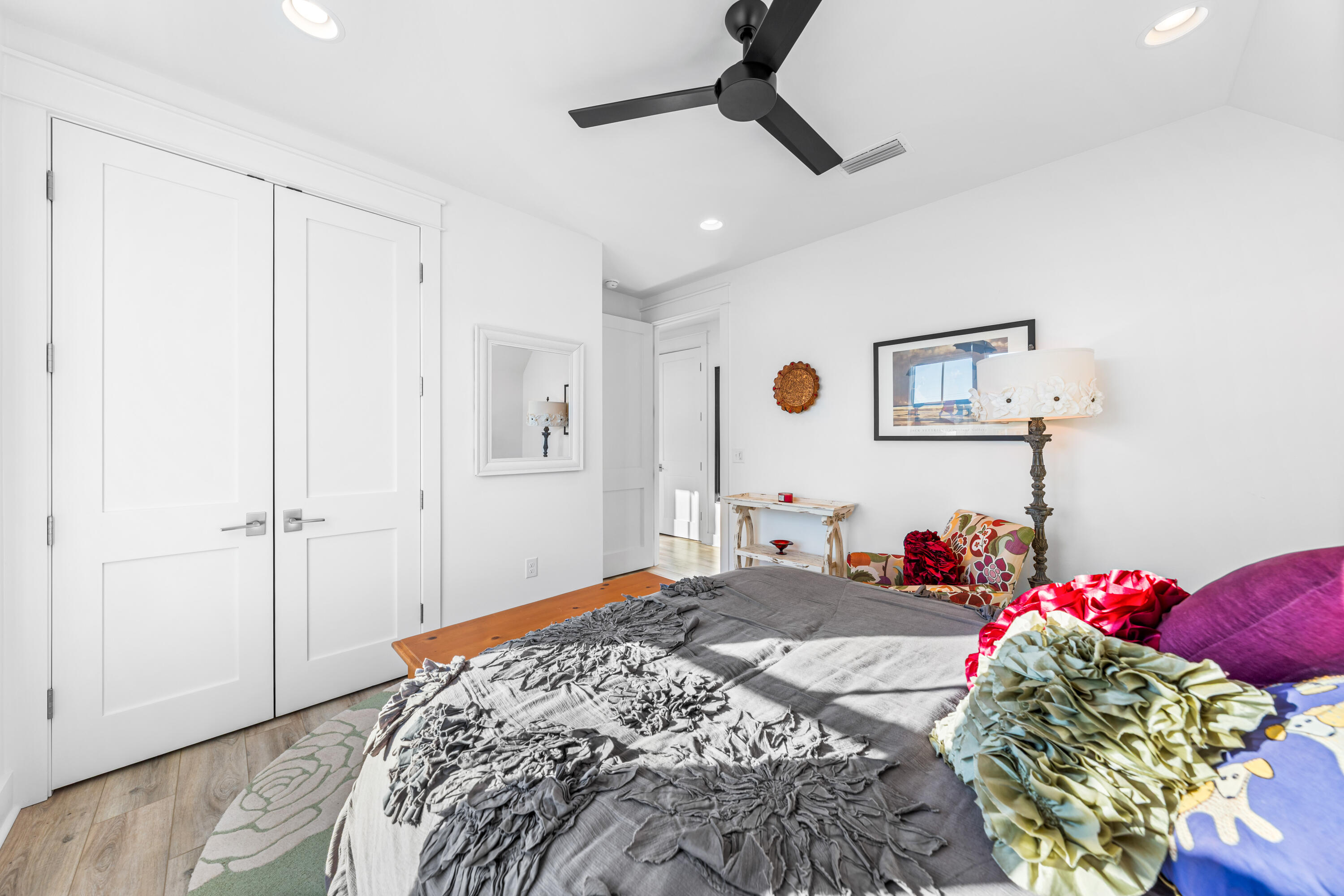 41 East Firethorn Cir Inlet Beach Inlet Beach, FL 32461 - Photo 57 of 66 a bedroom with bed and a chandelier