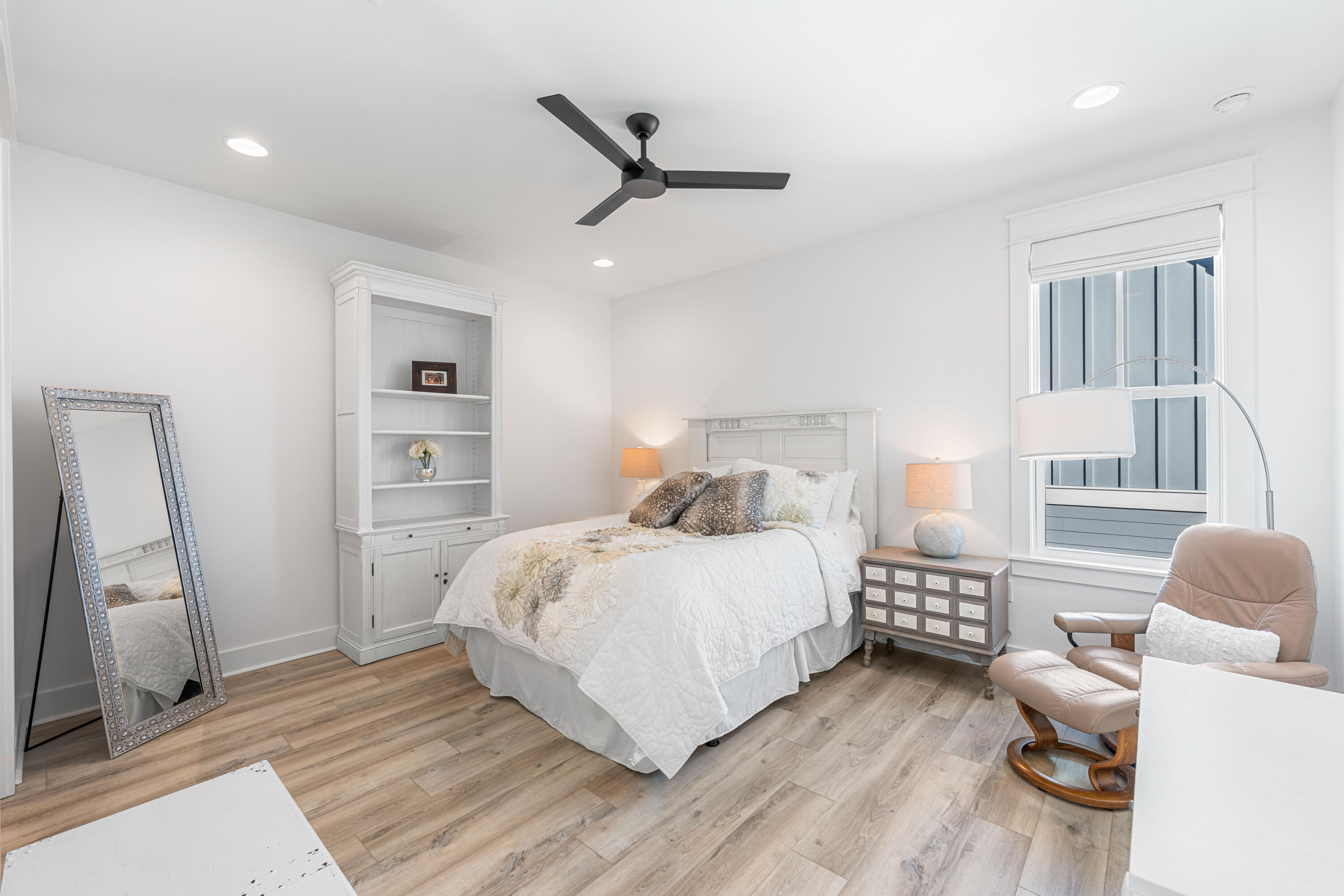 41 East Firethorn Cir Inlet Beach Inlet Beach, FL 32461 - Photo 58 of 66 a bedroom with a bed and a large window