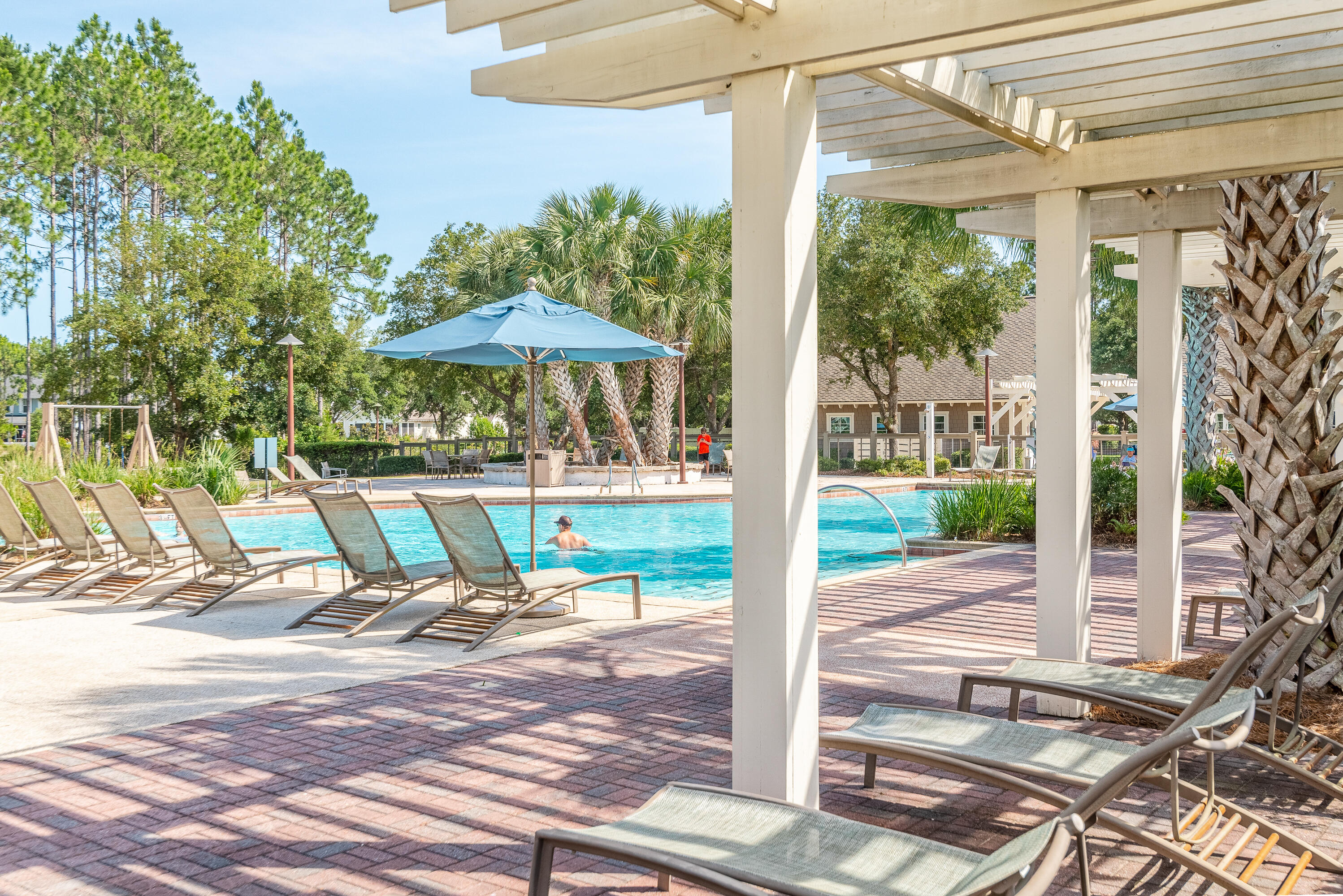 41 East Firethorn Cir Inlet Beach Inlet Beach, FL 32461 - Photo 61 of 66 a view of a swimming pool with a patio