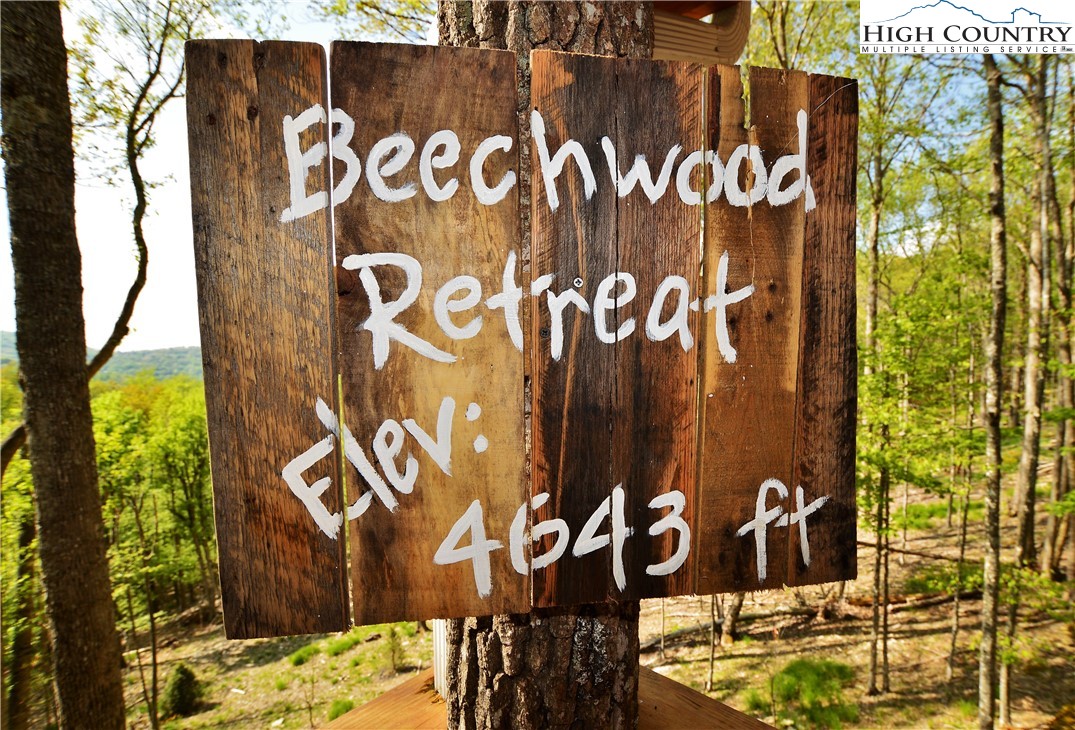 143 Tamarack Road Beech Mountain, NC 28604 - Photo 3 of 47 a street sign on a wall of the wall