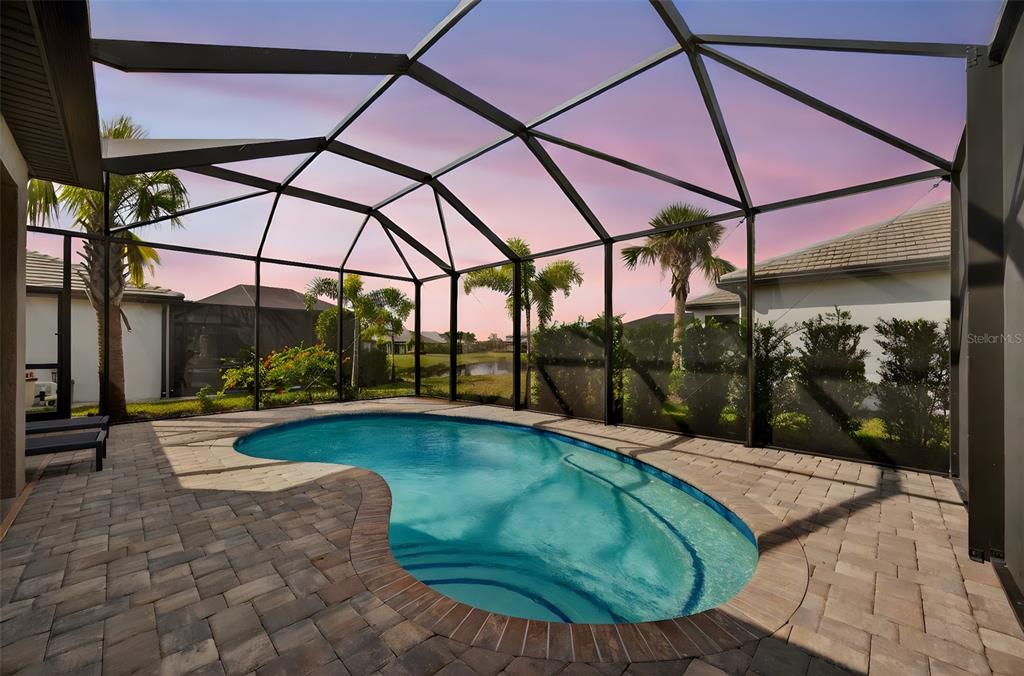 17744 Savory Mist Circle Lakewood Ranch, FL 34211 - Photo 14 of 55 a view of a swimming pool with a patio