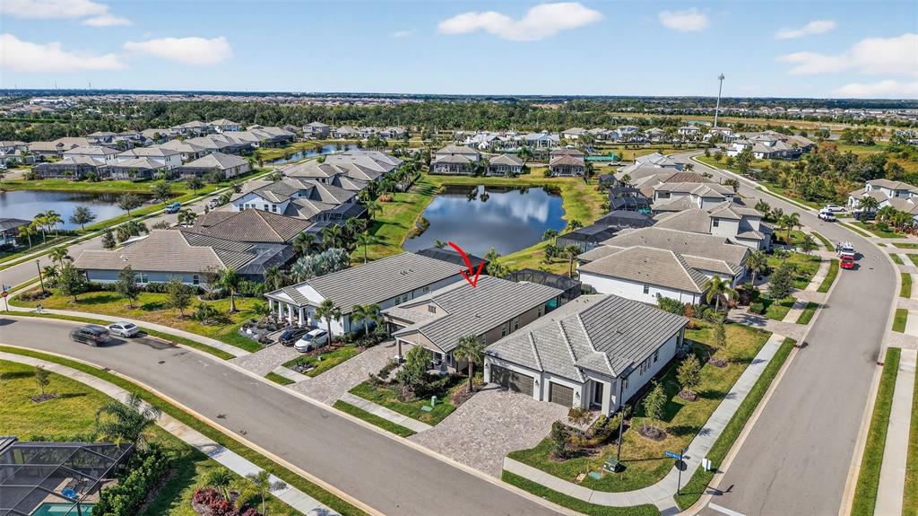 17744 Savory Mist Circle Lakewood Ranch, FL 34211 - Photo 53 of 55 an aerial view of residential houses with outdoor space