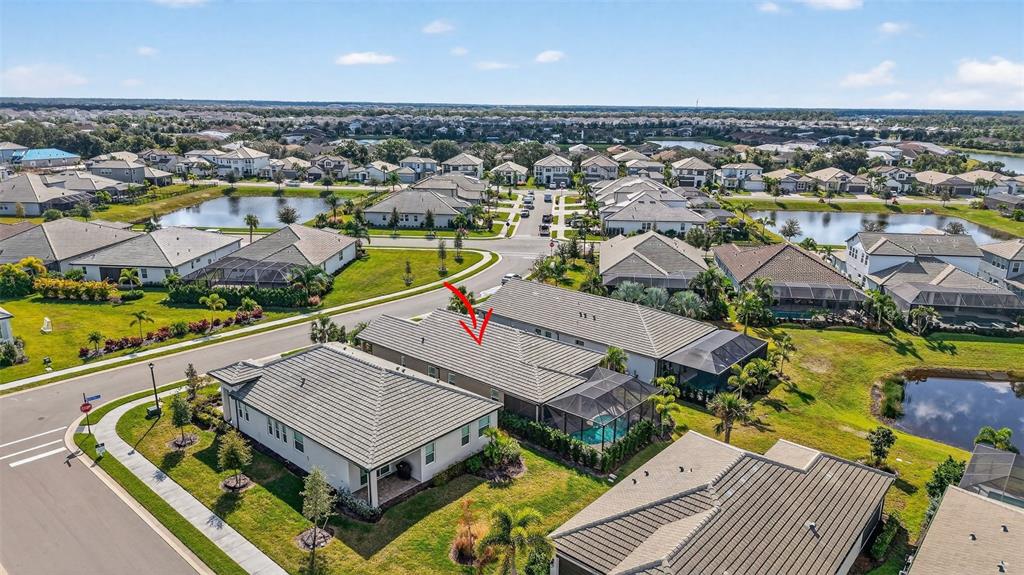 17744 Savory Mist Circle Lakewood Ranch, FL 34211 - Photo 54 of 55 an aerial view of a house with a ocean view