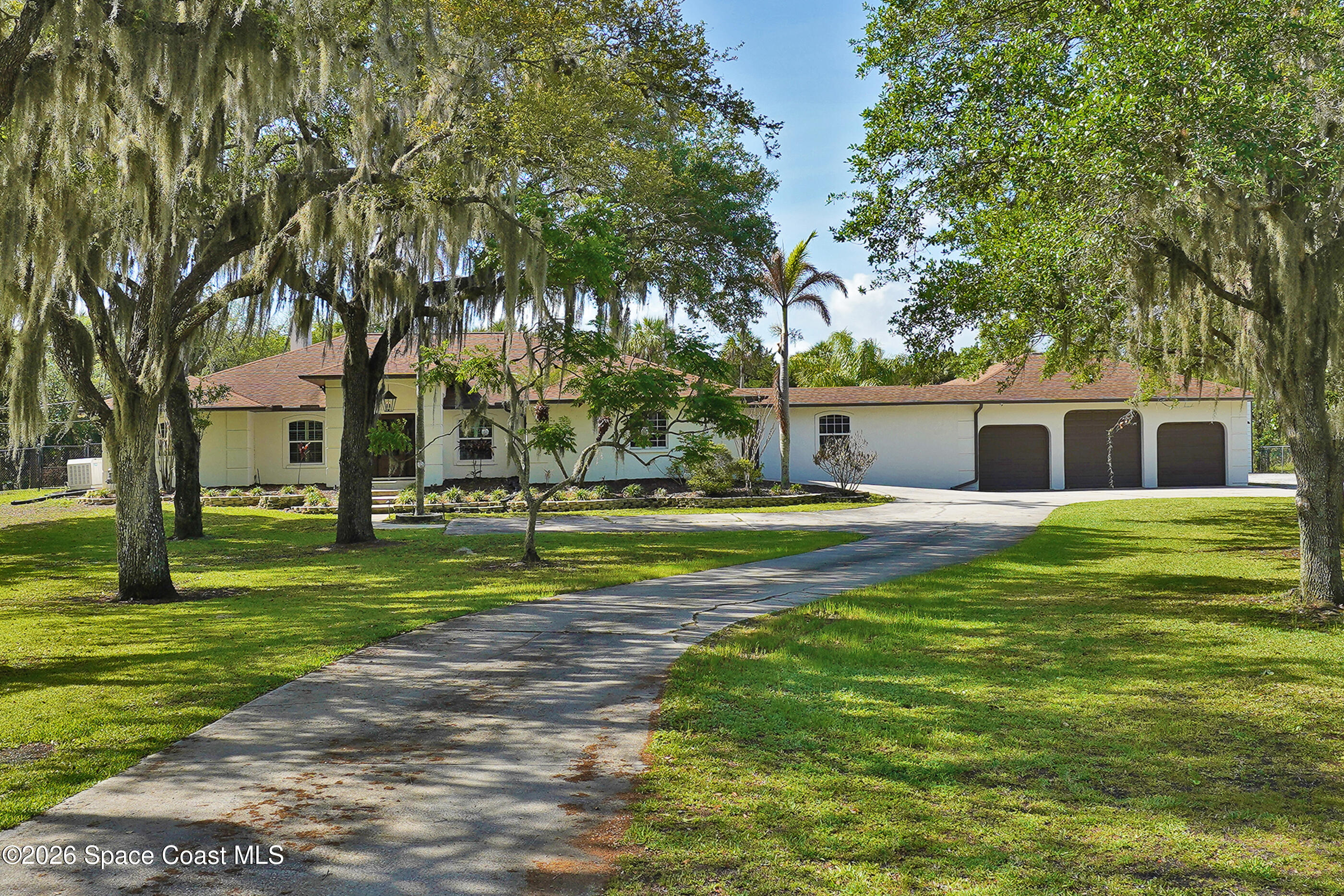 475 East Hall Road Merritt Island, FL 32953 - Photo 1 of 48 Front