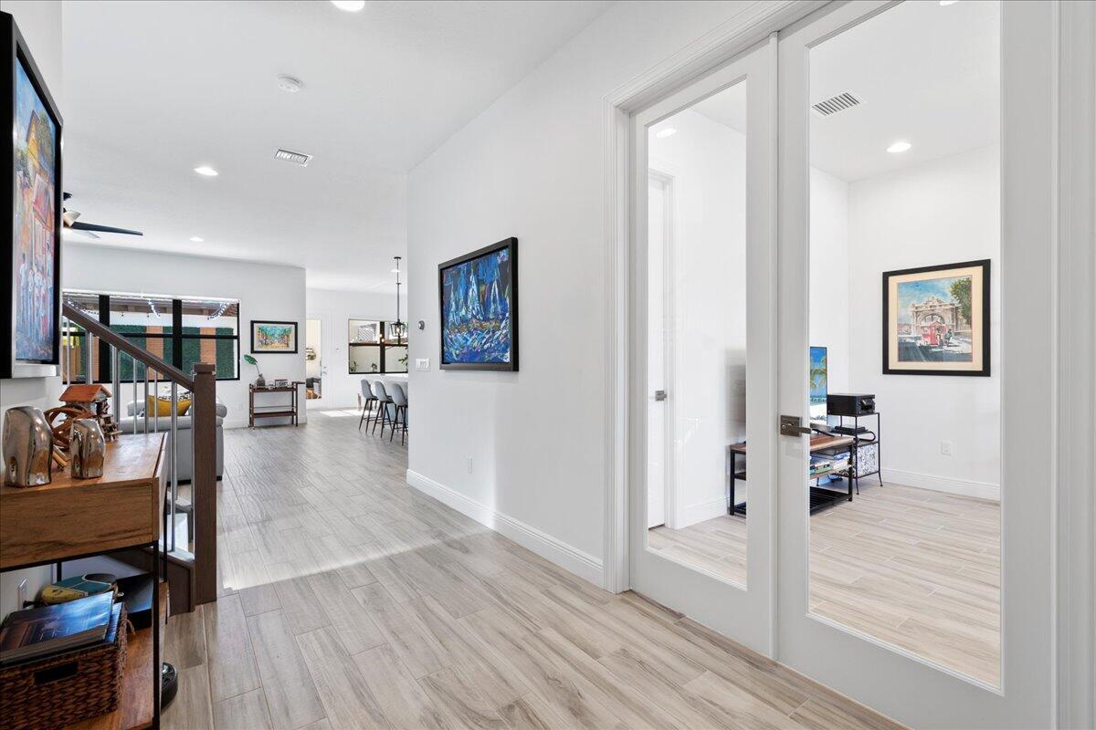 13121 Alton Road Palm Beach Gardens, FL 33418 - Photo 7 of 45 Foyer to Office/Den