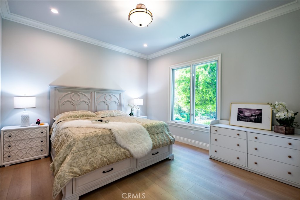 894 Fallen Leaf Road Arcadia, CA 91006 - Photo 18 of 28 a bedroom with a large bed and a tv