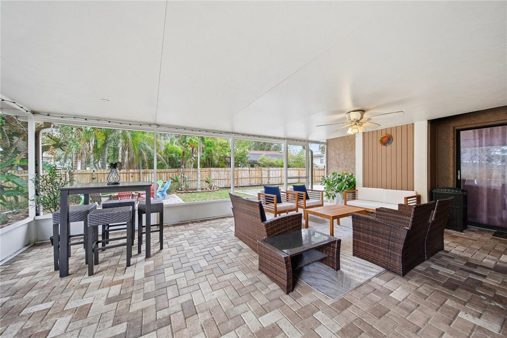 4602 Buckeye Road Tampa, FL 33624 - Photo 27 of 36 a living room with furniture and a large window