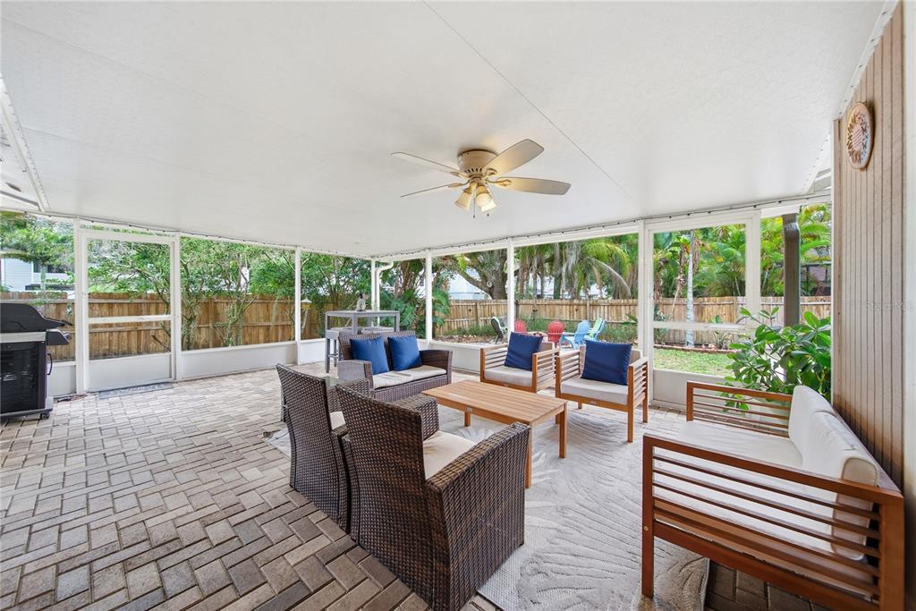 4602 Buckeye Road Tampa, FL 33624 - Photo 28 of 36 a living room with furniture and a large window