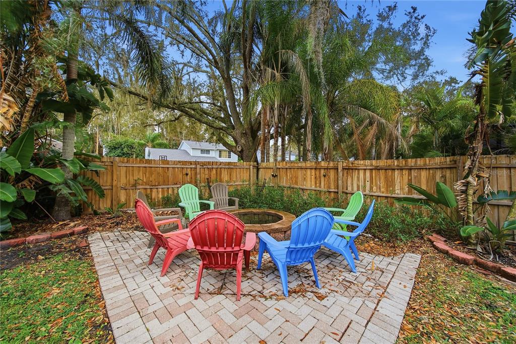 4602 Buckeye Road Tampa, FL 33624 - Photo 30 of 36 a view of outdoor sitting area with furniture and wooden fence