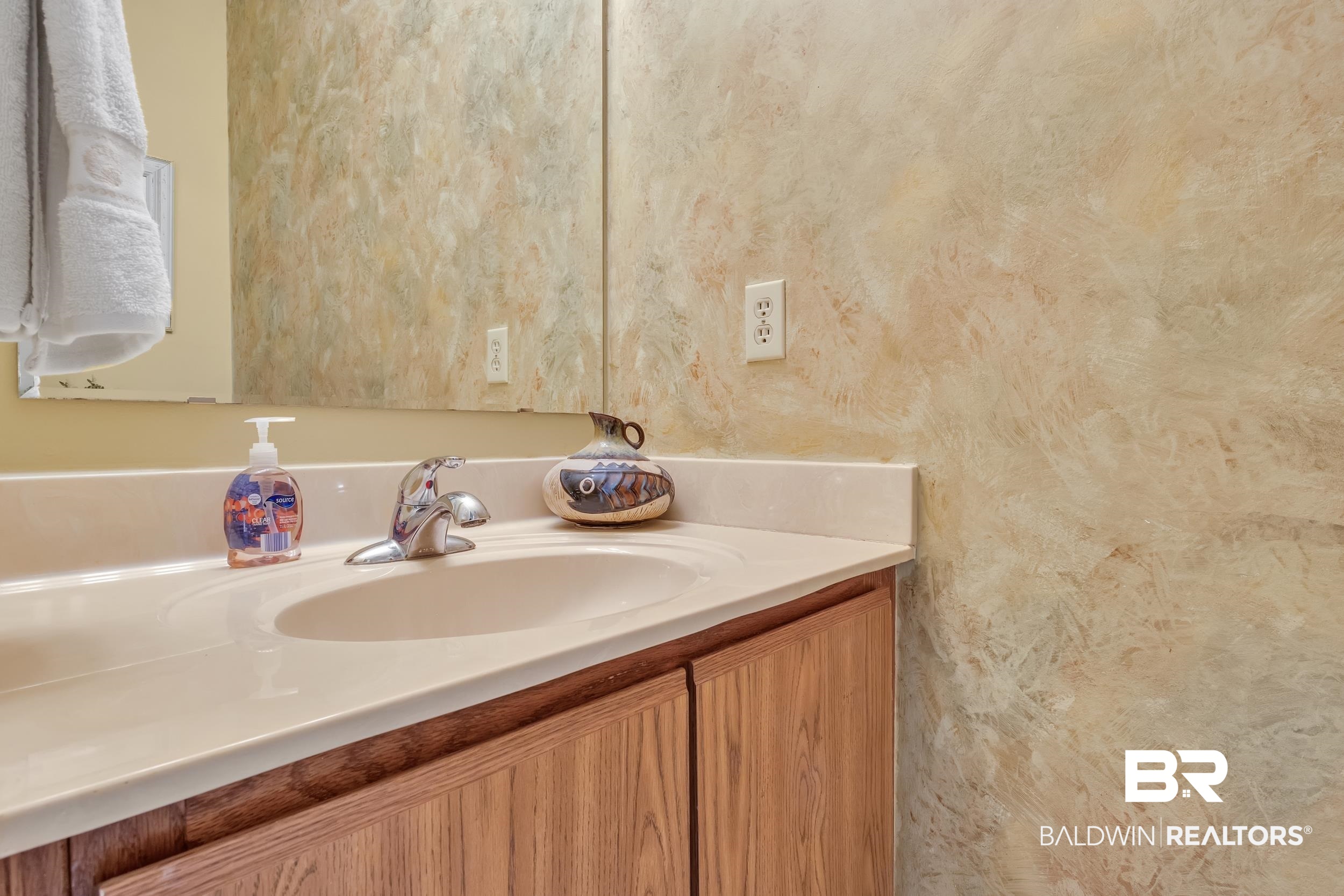 3256 Loop Road, Unit 2 Orange Beach, AL 36561 - Photo 19 of 25 Integrated vanity with a single basin sink and chrome faucet