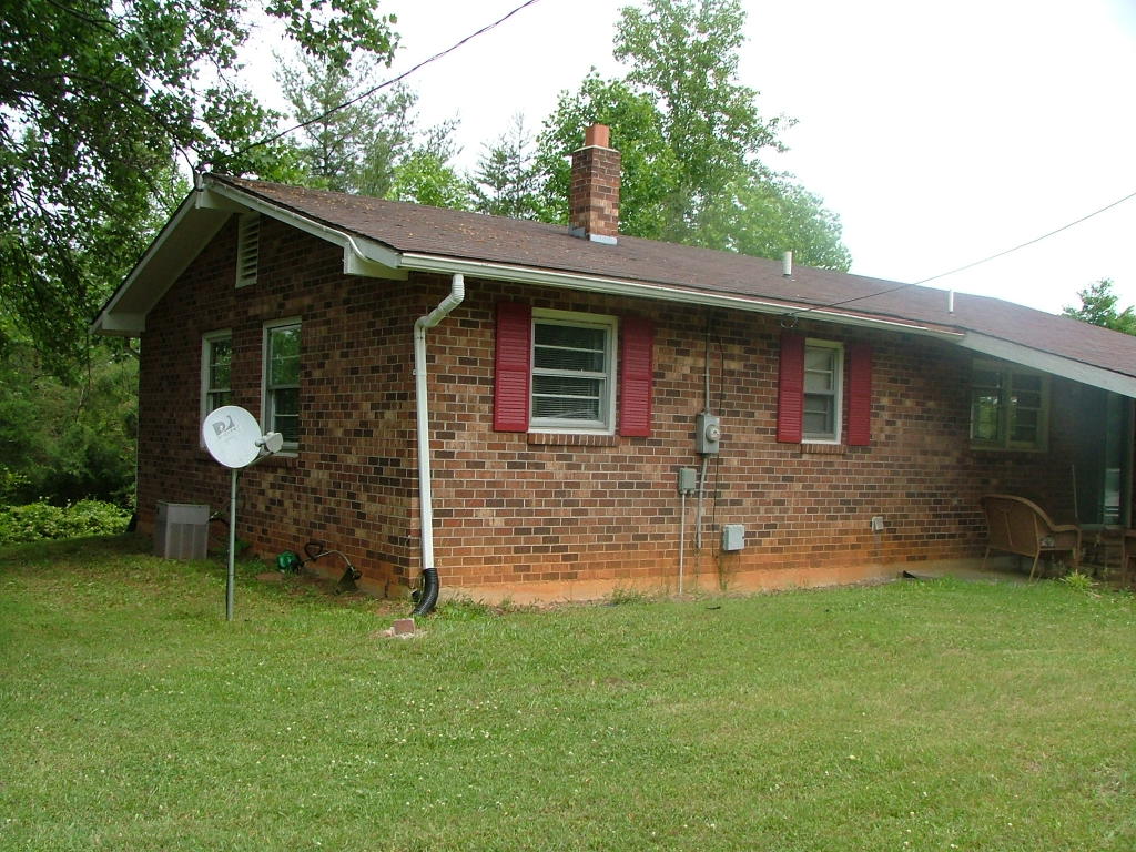835 Falcon Ridge Road Rocky Mount, VA 24151 - Photo 4 of 8 a front view of a house with garden
