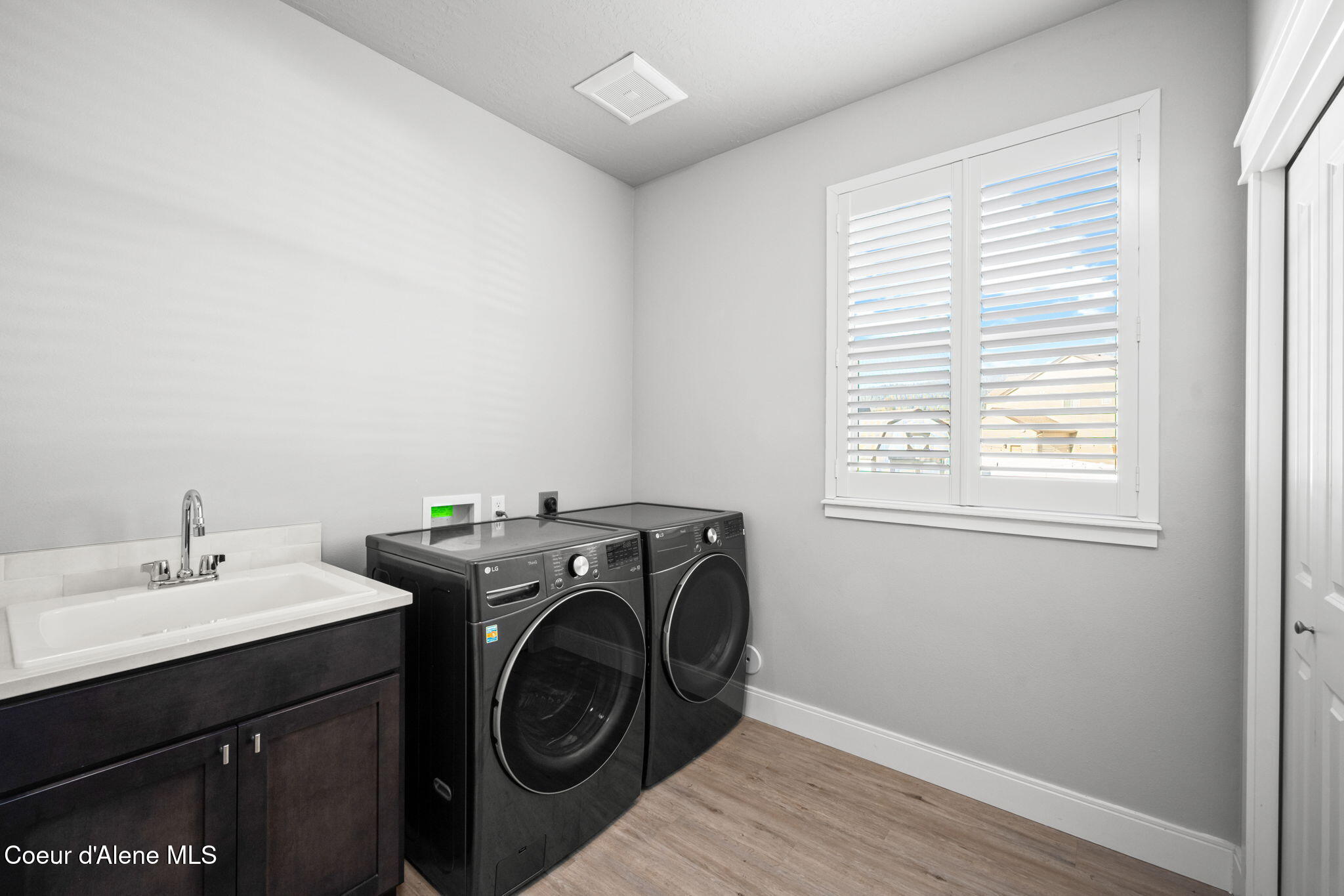 15289 North Liane Lane Rathdrum, ID 83858 - Photo 37 of 64 Laundry w/sink and cabinets