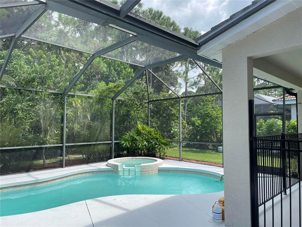 759 Fordingbridge Way Osprey, FL 34229 - Photo 40 of 51 a view of a backyard with a swimming pool