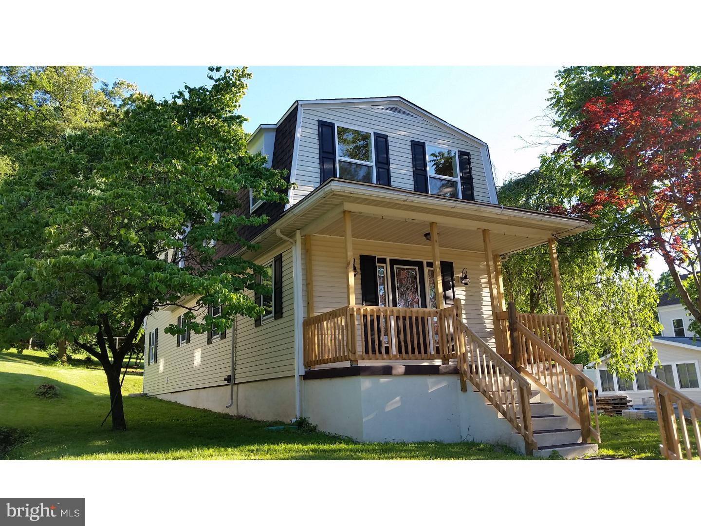 309 Reed Street Mohnton, PA 19540 - Photo 1 of 25 a front view of a house with a yard
