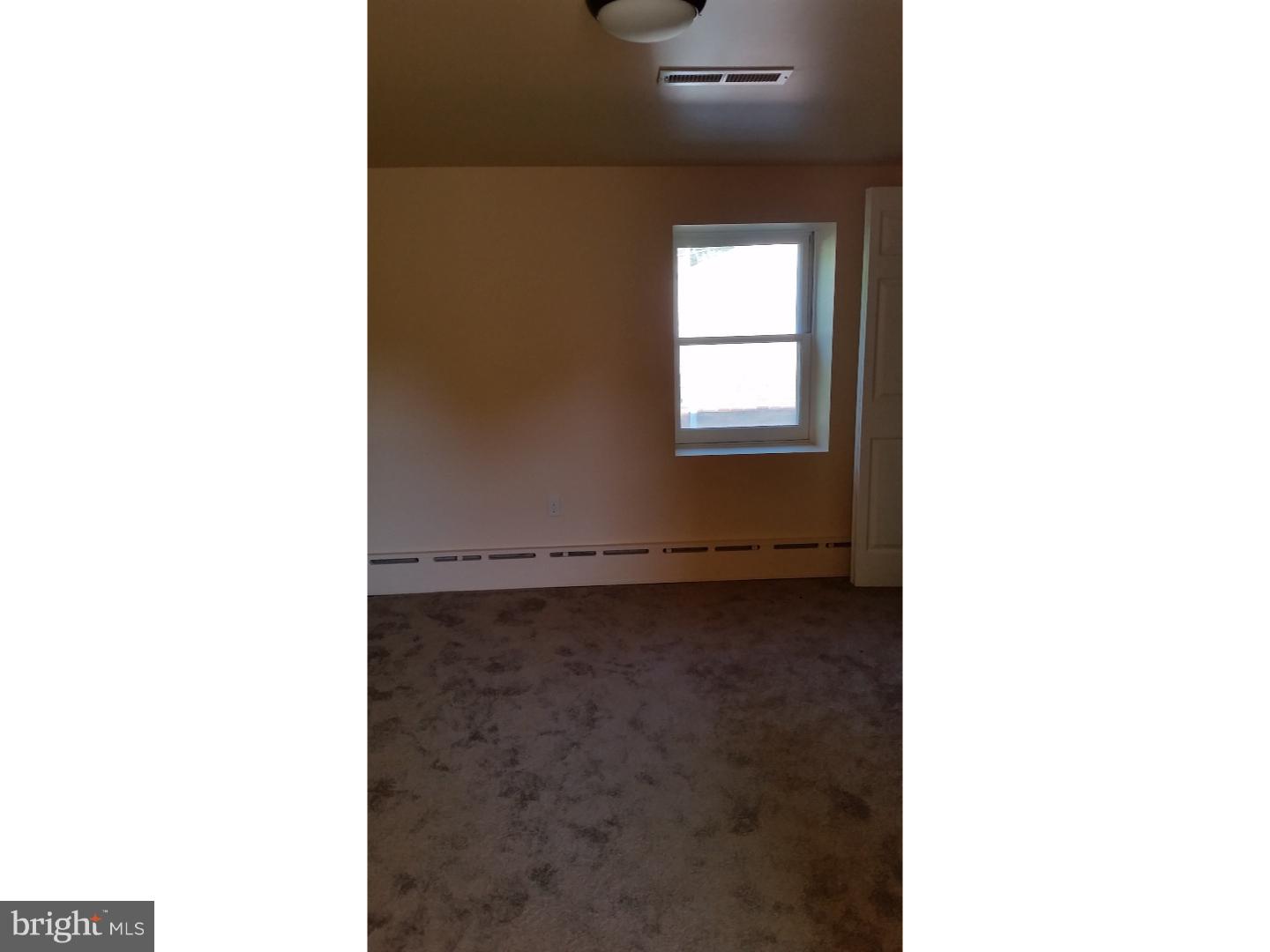 309 Reed Street Mohnton, PA 19540 - Photo 16 of 25 a view of a room that has a window in it